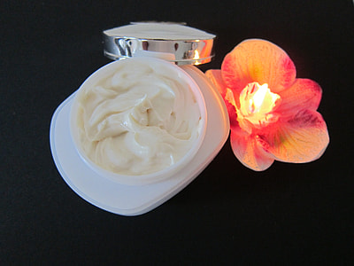 cream beside orchid flower thumbnail
