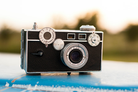 selective focus photography of black and gray camera thumbnail