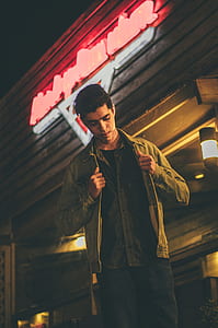 man fixing his jacket thumbnail