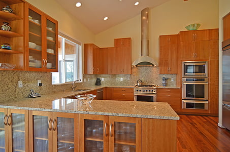clear glass bowl on top of grey ceramic coutner top inside kitchen thumbnail