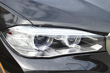 close-up photography of vehicles headlight thumbnail