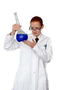 woman in laboratory gown holding glass flask thumbnail