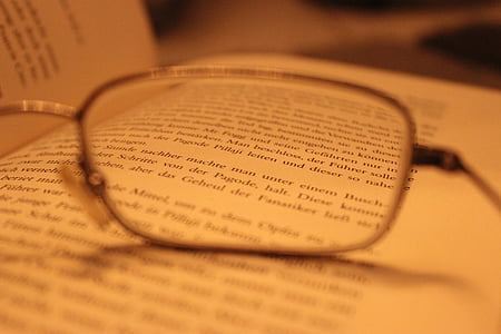 eyeglasses on top on book page thumbnail