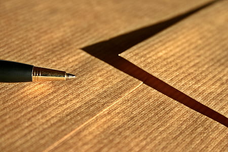 black pen on table thumbnail