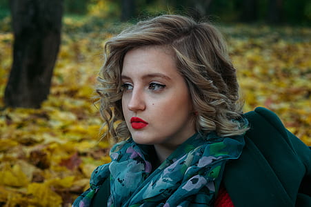 Depth of Field Photography of Woman With Green and White Floral Chiffon Fabric Scarf thumbnail