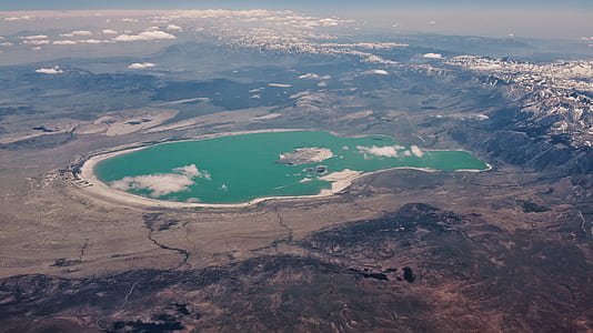 aerial photography of lake at day time thumbnail