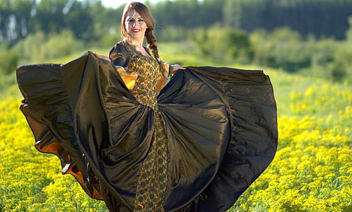 close-up photo of woman in black dress thumbnail