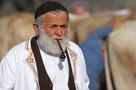 man wearing black taqiyah skullcap thumbnail