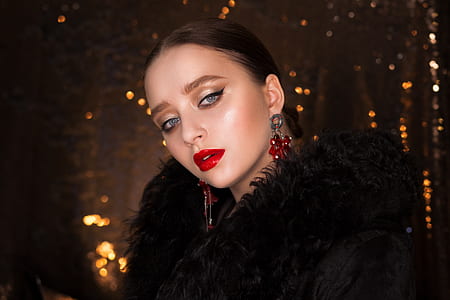 woman wearing black fur coat thumbnail