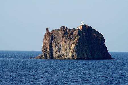 island surrounded with ocean water at daytime thumbnail