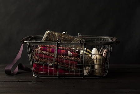 gray metal basket in dimmed room thumbnail
