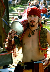 man wearing red headdress during daytime thumbnail