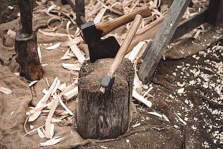 two ax's on wood log thumbnail