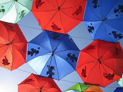 assorted-color umbrellas under the clear sky during daytime thumbnail