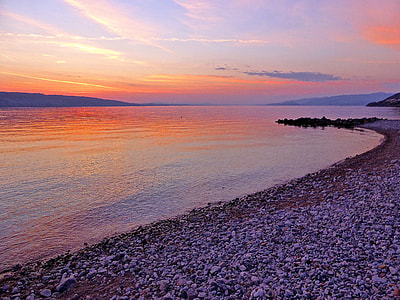 sea stones near to body of water thumbnail