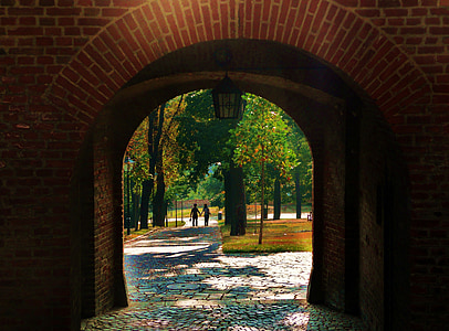 brown brick arc building during daytime thumbnail