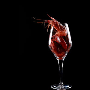 shrimps inside clear wine glass thumbnail