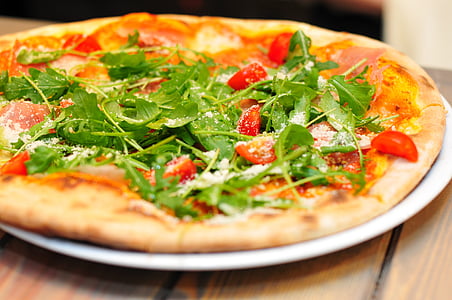 meat and vegetable pizza on tray thumbnail