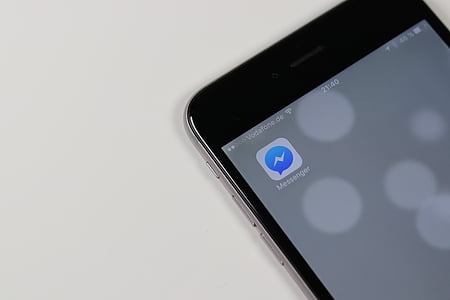 black Android smartphone showing messanger application thumbnail