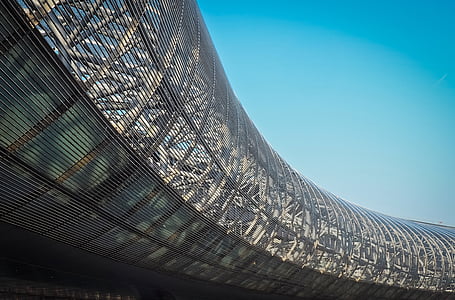 worms eye view photography of white steel structure thumbnail