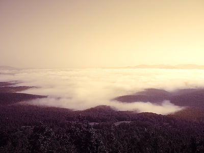 clouds covering mountains thumbnail