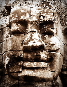 closeup photo of brown concrete statue thumbnail