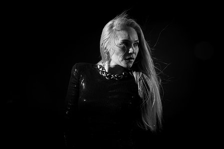 grayscale photo of woman starring somwhere thumbnail