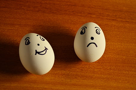 two white eggs on brown surface thumbnail