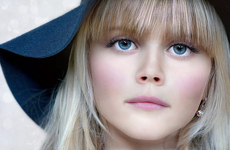 woman in black hat thumbnail
