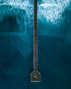bird's eye view of brown wooden pier thumbnail