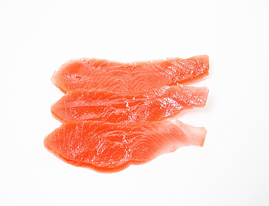 three slices of raw fish fillet thumbnail