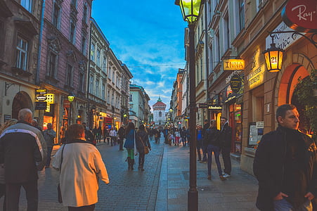 people walking towards buildings thumbnail