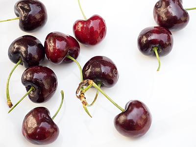 red berries on white surface thumbnail