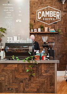 man standing on cambe coffee bar thumbnail