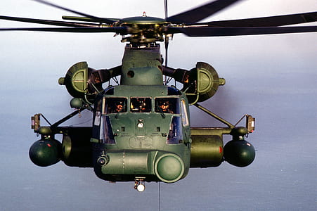 men flying helicopter thumbnail