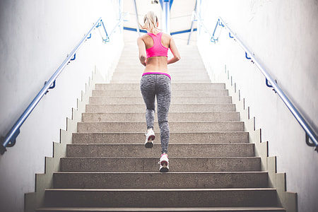 Young Fitness Girl Running Up The Stairs thumbnail