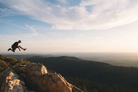 man jumping on mountain thumbnail