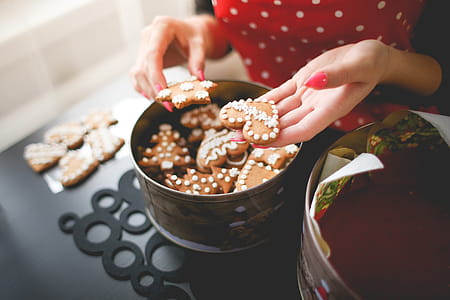 Young Woman Showing Freshly Baked Christmas Cookies thumbnail