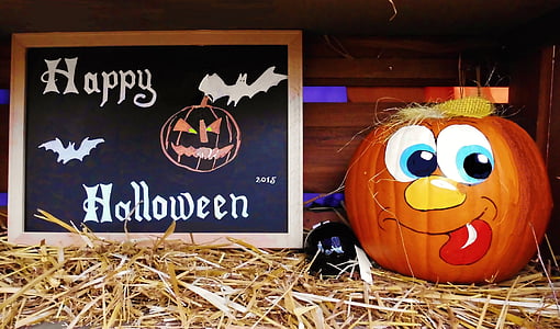 Halloween-themed decors on hay thumbnail