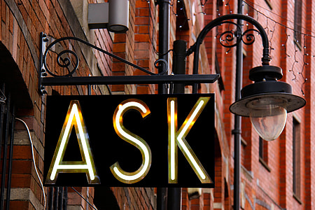 photography of black metal sconce street light with ASK LED light signage thumbnail