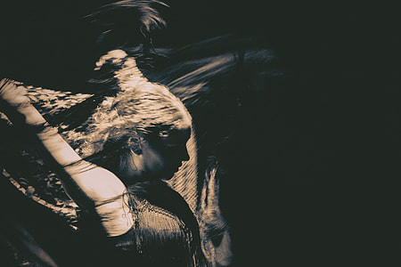 gray-scale photography of woman dancing thumbnail