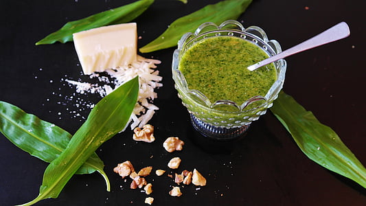 herbal juice in clear glass bowl on top of black table thumbnail