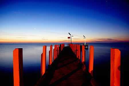 empty dock near body of water thumbnail