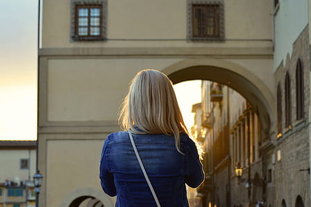 woman standing near building thumbnail