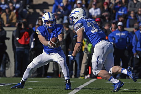 Two Football Players on Field thumbnail
