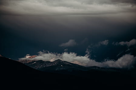 aerial view of mountain and clouds during daytime thumbnail