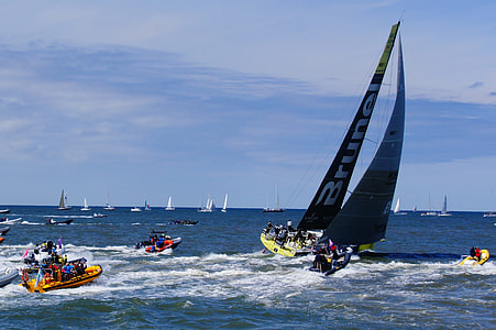 green and black boat on sea thumbnail