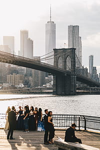 people taking selfie near brooklyn bridge thumbnail