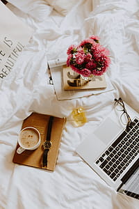 Morning coffee in bed. Working in bed thumbnail