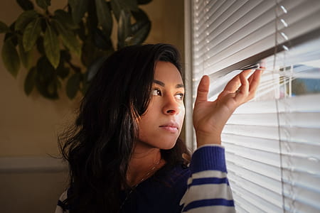 woman peaking on window thumbnail